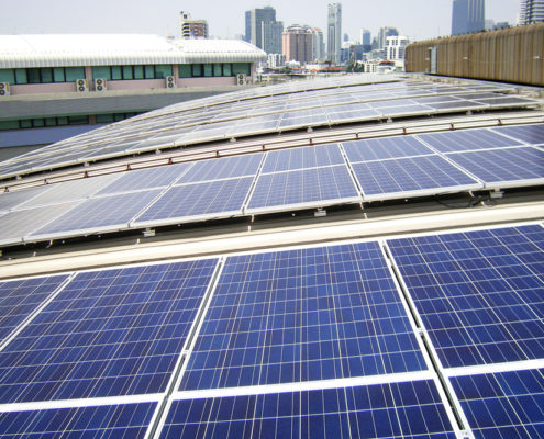 Rooftop Solar PV Panels on a Factory Curve-Roof located in Bangkok, Thailand